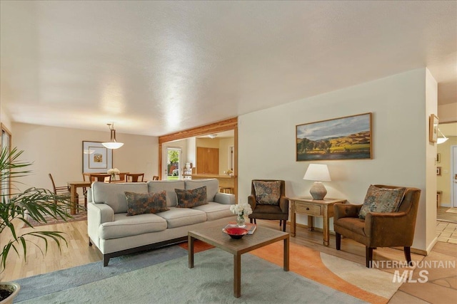 424 N Mobley Dr, Boise, ID 83712 - living room with baseboards and light wood-type flooring