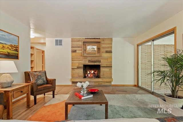 424 N Mobley Dr, Boise, ID 83712 - living room with a fireplace and baseboards