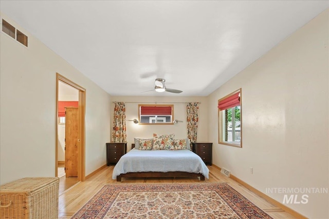 424 N Mobley Dr, Boise, ID 83712 - bedroom featuring light wood-style floors, ceiling fan, and baseboards