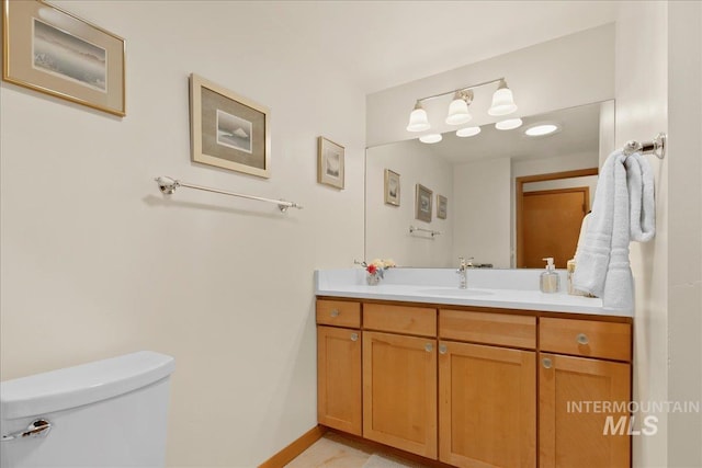 424 N Mobley Dr, Boise, ID 83712 - half bath with toilet, vanity, and baseboards