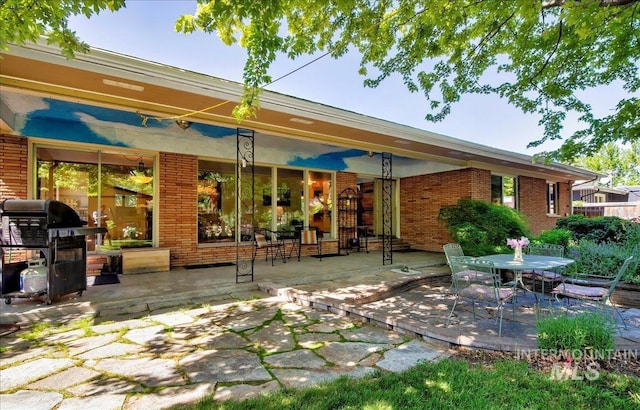 424 N Mobley Dr, Boise, ID 83712 - view of patio / terrace with a grill and outdoor dining space