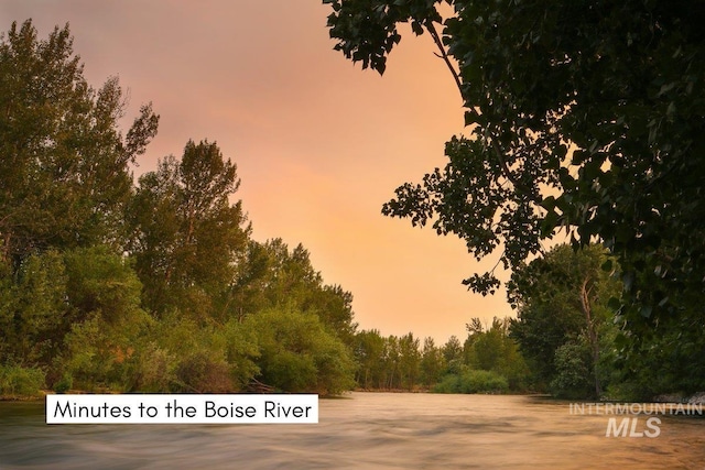 424 N Mobley Dr, Boise, ID 83712 - nature at dusk featuring a view of trees