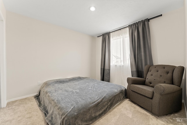 bedroom with light carpet, baseboards, and recessed lighting