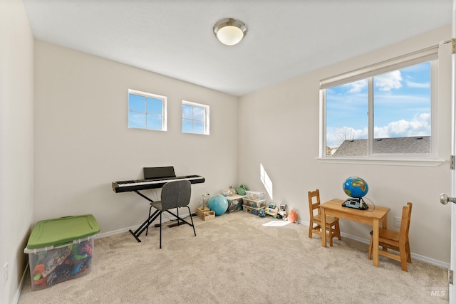 game room with carpet flooring and baseboards