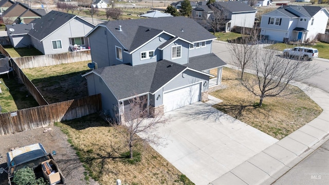 drone / aerial view with a residential view