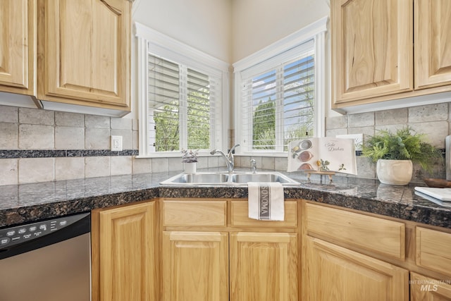 kitchen with a sink, light brown cabinets, tile countertops, tasteful backsplash, and stainless steel dishwasher