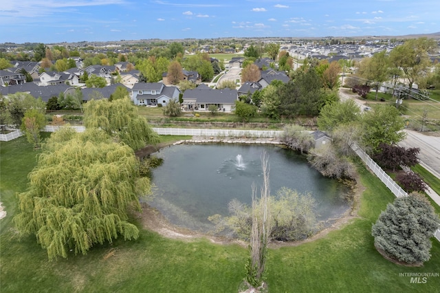 aerial view with a water view and a residential view