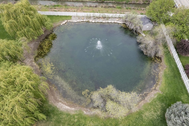 bird's eye view with a water view