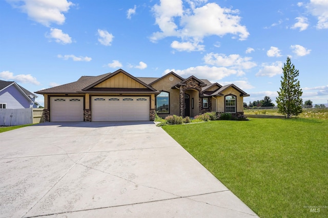 1041 Lupine Ln, Kimberly, ID 83341 - view of front of home featuring stone siding, a garage, driveway, and stucco siding