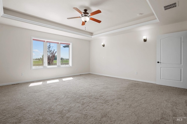 1041 Lupine Ln, Kimberly, ID 83341 - carpeted empty room with a tray ceiling, a ceiling fan, and a smoke detector