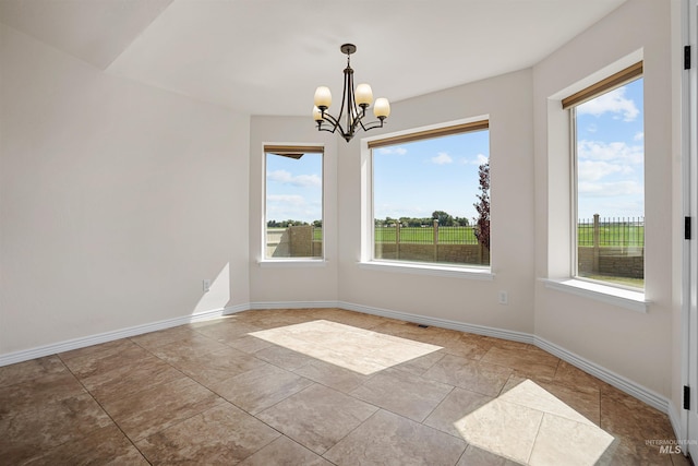 1041 Lupine Ln, Kimberly, ID 83341 - empty room with a chandelier and baseboards