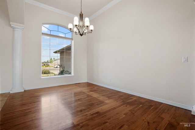 1041 Lupine Ln, Kimberly, ID 83341 - spare room featuring ornate columns, plenty of natural light, wood finished floors, and ornamental molding