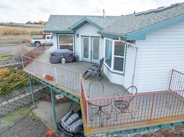 rear view of house with a deck