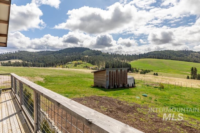 property view of mountains with a rural view and a forest view