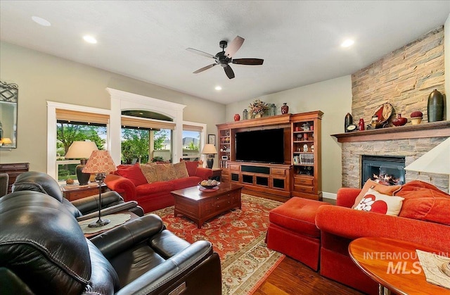 10318 W Adirondack Ct, Star, ID 83669 - living room with wood finished floors, a ceiling fan, a stone fireplace, and recessed lighting