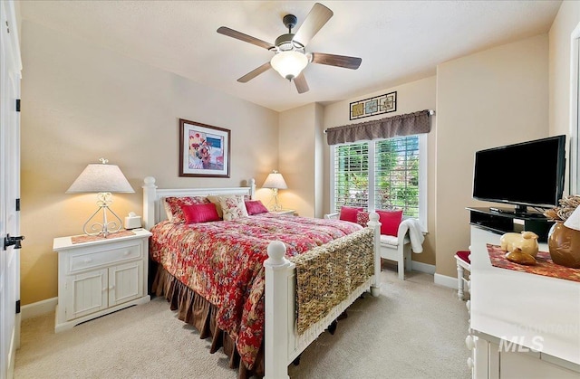 10318 W Adirondack Ct, Star, ID 83669 - bedroom featuring light carpet, baseboards, and ceiling fan