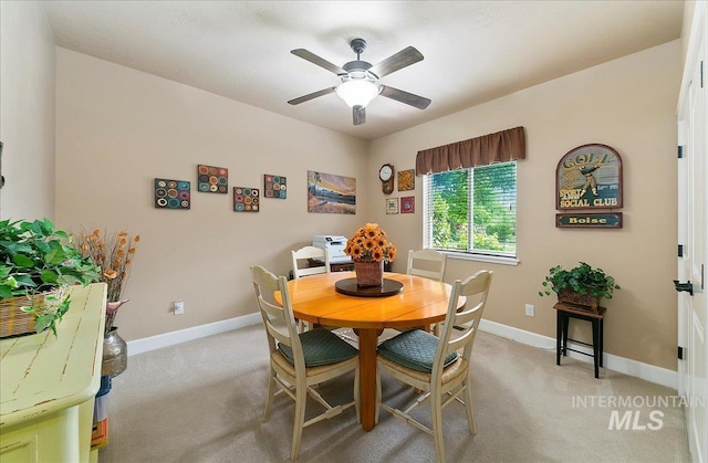 10318 W Adirondack Ct, Star, ID 83669 - dining space featuring light carpet, a ceiling fan, and baseboards