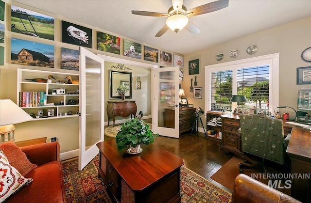 10318 W Adirondack Ct, Star, ID 83669 - home office featuring french doors, wood finished floors, ceiling fan, and baseboards