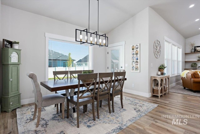 942 Paintbrush, Kimberly, ID 83341 - dining area featuring lofted ceiling, plenty of natural light, light wood finished floors, a chandelier, and recessed lighting