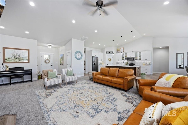 942 Paintbrush, Kimberly, ID 83341 - living area featuring high vaulted ceiling, baseboards, a ceiling fan, light carpet, and recessed lighting