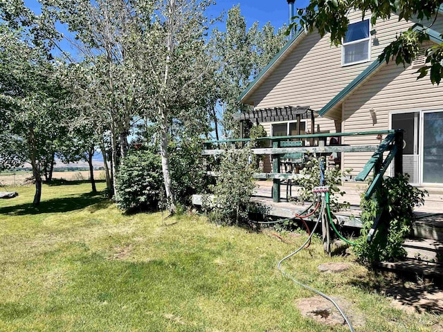 view of yard featuring a pergola and a wooden deck