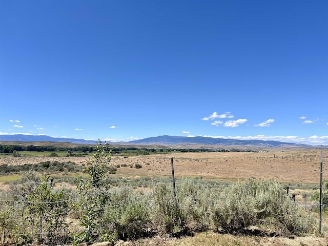 view of mountain feature featuring a rural view