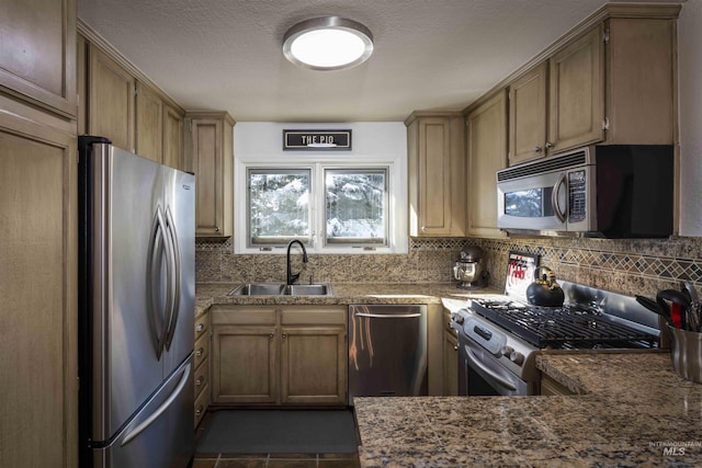 2639 Ridge Ln, Sun Valley, ID 83353 - kitchen featuring appliances with stainless steel finishes, tasteful backsplash, and a peninsula