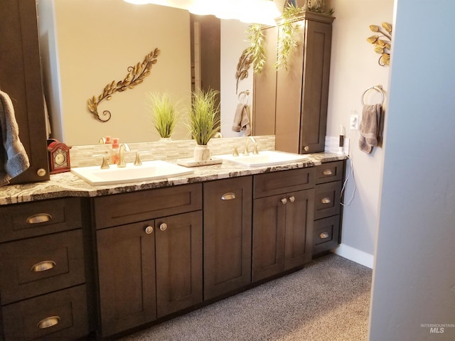 3847 N 2456 E, Filer, ID 83328 - full bathroom with double vanity, baseboards, and a sink