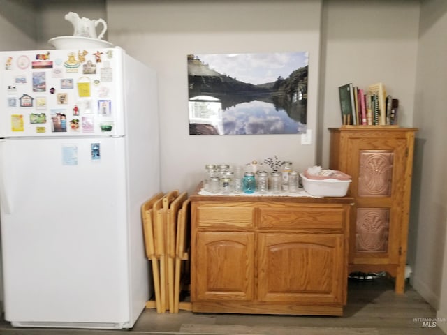 3847 N 2456 E, Filer, ID 83328 - interior space with light wood finished floors, light countertops, and freestanding refrigerator