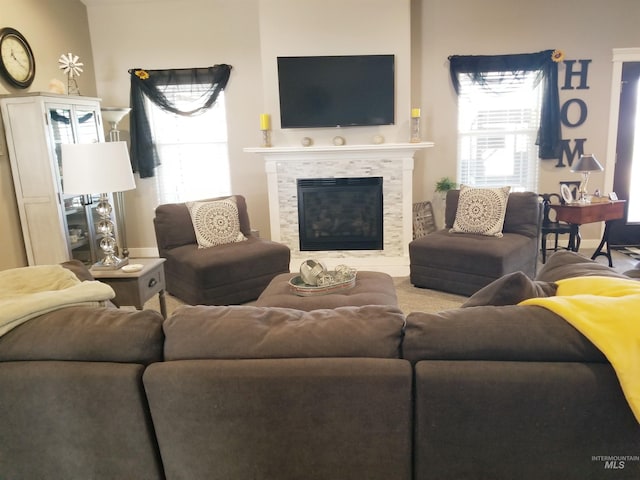 3847 N 2456 E, Filer, ID 83328 - living area featuring a tile fireplace and a wealth of natural light