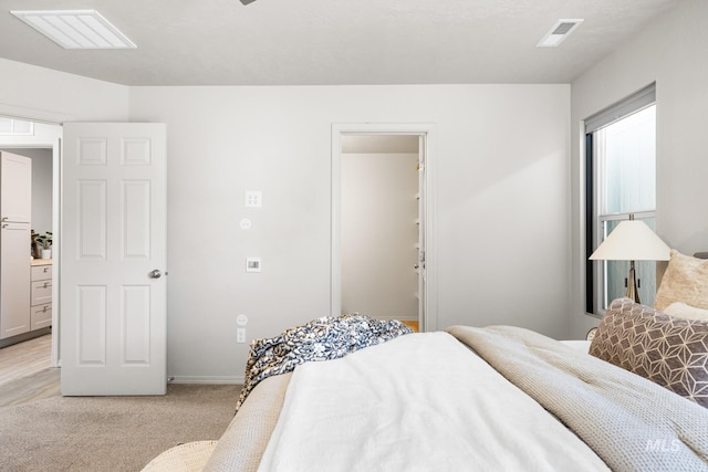 12850 Conner St, Caldwell, ID 83607 - bedroom featuring light colored carpet and baseboards