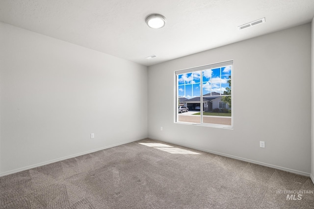12850 Conner St, Caldwell, ID 83607 - carpeted empty room featuring baseboards