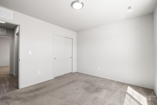 12850 Conner St, Caldwell, ID 83607 - unfurnished bedroom with carpet, baseboards, and a closet