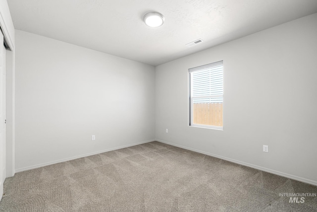 12850 Conner St, Caldwell, ID 83607 - spare room with carpet flooring and baseboards