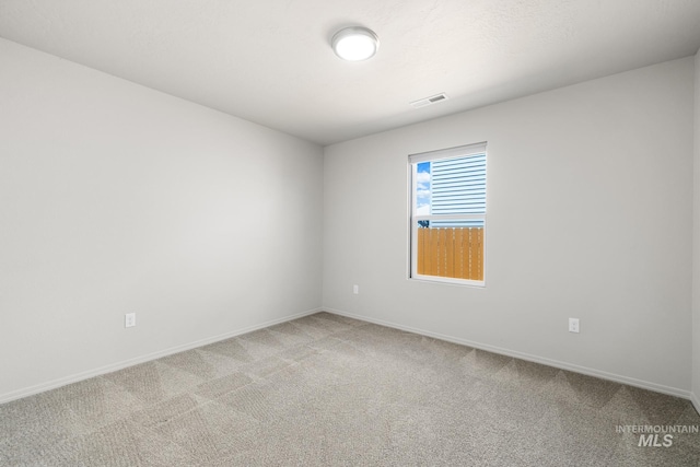 12850 Conner St, Caldwell, ID 83607 - empty room featuring light colored carpet and baseboards