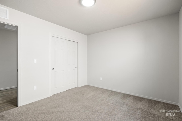12850 Conner St, Caldwell, ID 83607 - unfurnished bedroom featuring carpet floors, a closet, and baseboards