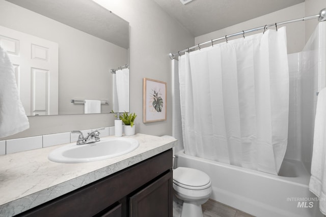 12850 Conner St, Caldwell, ID 83607 - full bath featuring vanity, shower / bath combo with shower curtain, and toilet