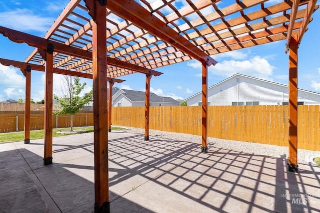 12850 Conner St, Caldwell, ID 83607 - fenced backyard featuring a patio area and a pergola