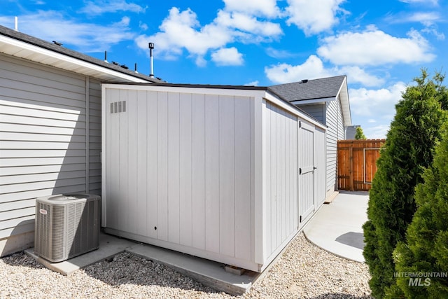 12850 Conner St, Caldwell, ID 83607 - view of property exterior with central AC unit and a shingled roof