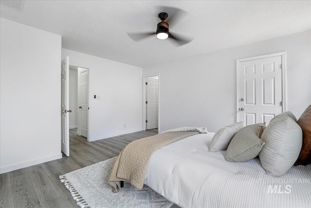 1471 Wrangler St, Twin Falls, ID 83301 - bedroom featuring wood finished floors, baseboards, and ceiling fan