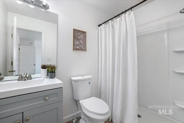 1471 Wrangler St, Twin Falls, ID 83301 - bathroom featuring toilet, vanity, and a shower with curtain