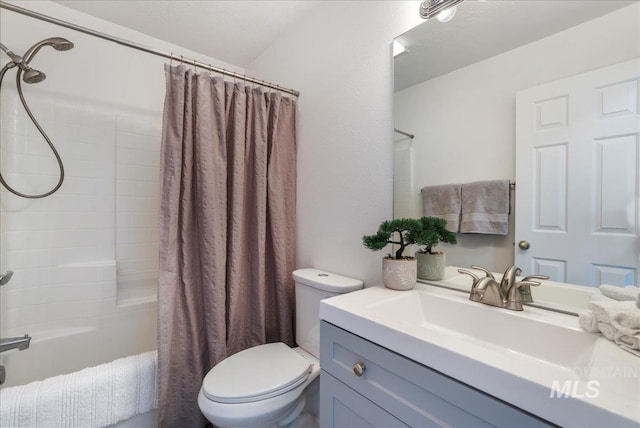 1471 Wrangler St, Twin Falls, ID 83301 - bathroom featuring vanity, shower / tub combo, and toilet