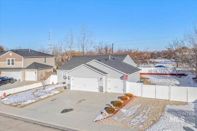 view of front of home with a garage