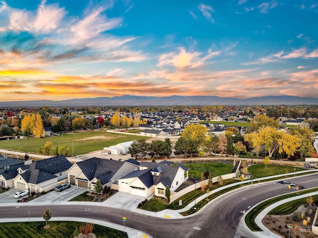 bird's eye view featuring a residential view and a mountain view