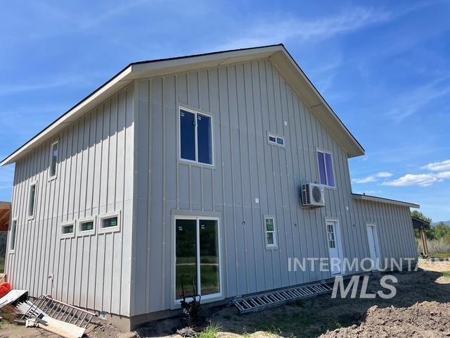 36 Coski Spgs, Garden Valley, ID 83622 - view of side of property with board and batten siding