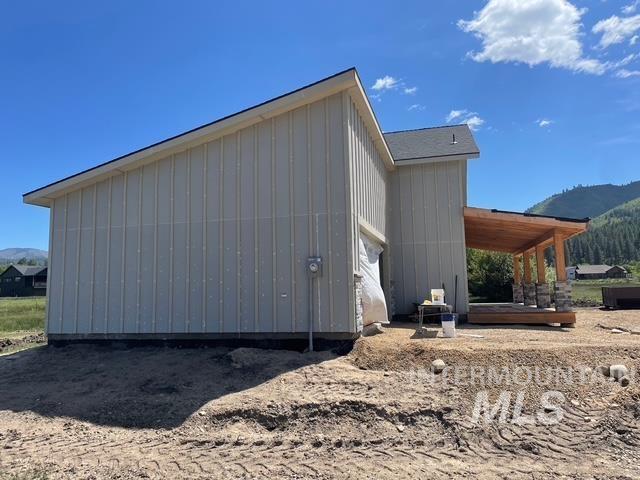 36 Coski Spgs, Garden Valley, ID 83622 - view of side of property featuring a mountain view and board and batten siding
