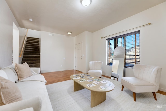 living room with light hardwood / wood-style flooring