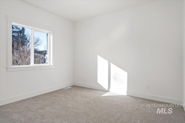 view of carpeted spare room