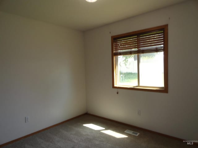 909 W Oakmont Ave, Nampa, ID 83686 - carpeted spare room featuring baseboards