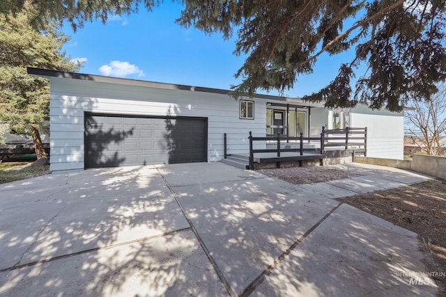 22168 Rio Vista Dr, Caldwell, ID 83607 - ranch-style home with concrete driveway and a garage